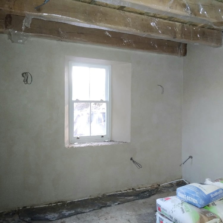 Traditional lime plastering - finish coat
