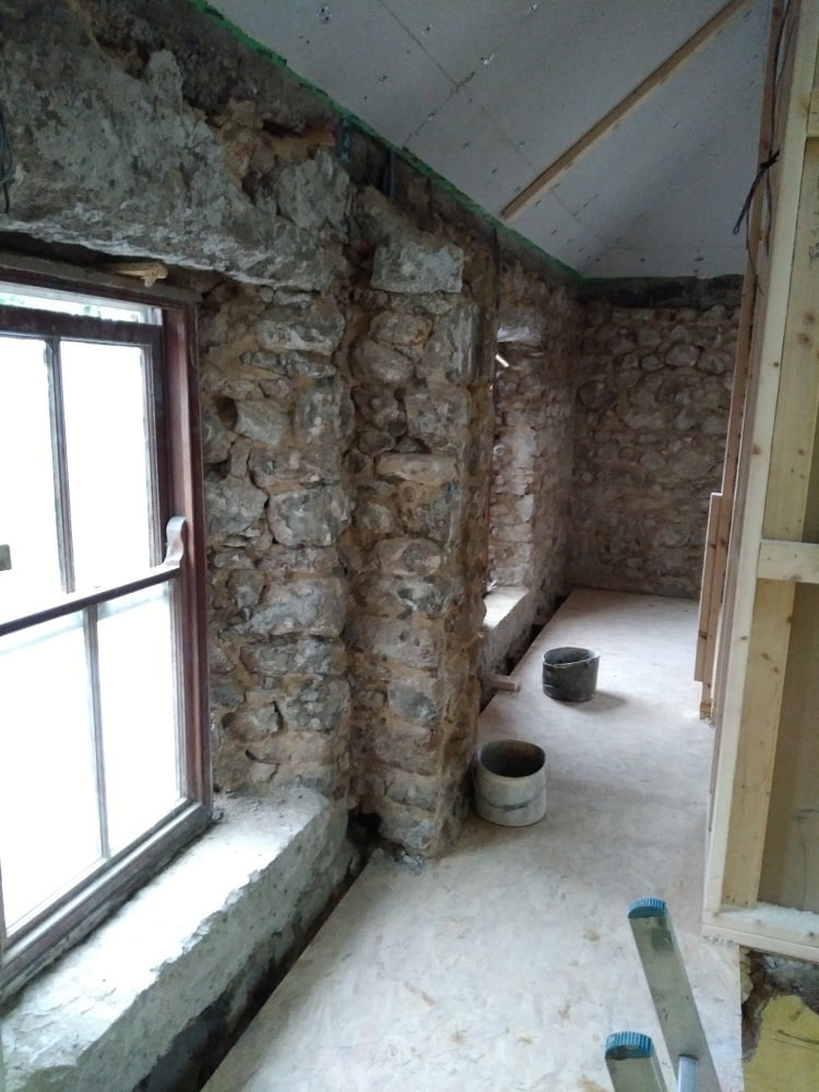 Walls prepared for lime plastering